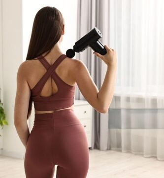 Using a massage gun on the upper back at home is one of the best ways to achieve muscle relaxation and stress relief.