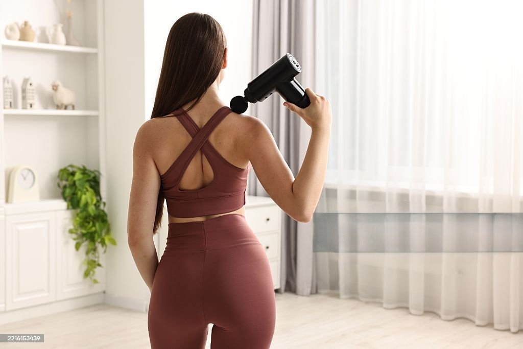 Using a massage gun on the upper back at home is one of the best ways to achieve muscle relaxation and stress relief.